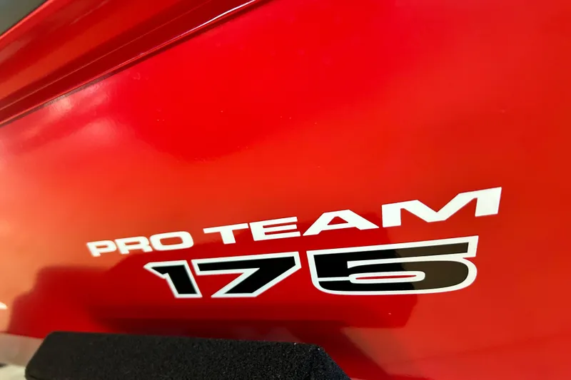 Slide: The Image of Red Tracker Pro Team 175 boat, model year 2026, close-up view. - 16