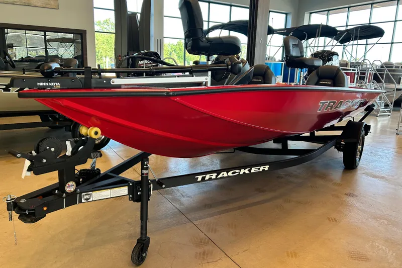 Slide: The Image of 2026 Tracker Pro Team 175 boat in showroom, vibrant red color, on trailer. - 14