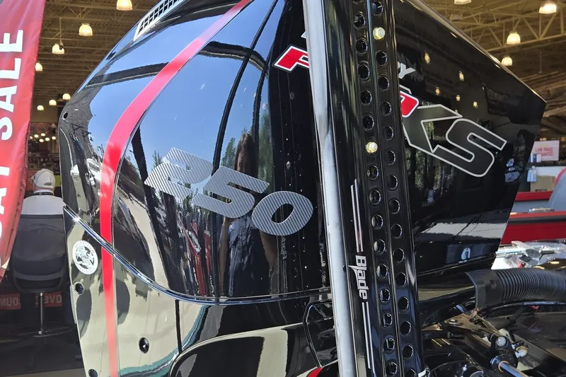 Slide: The Image of 2026 Nitro Z21 XL Pro boat engine with 250 horsepower displayed indoors. - 1
