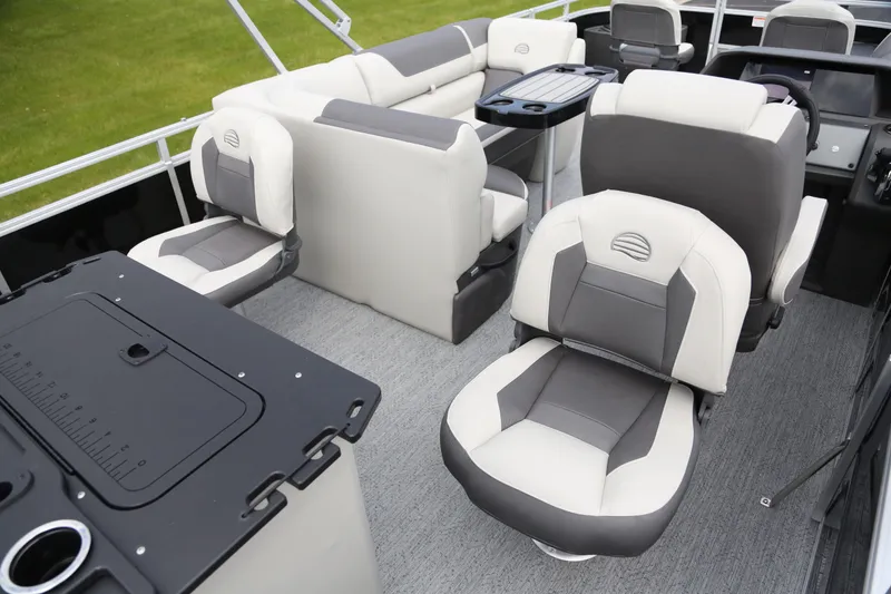 Slide: The Image of 2026 Sun Tracker Fishin' Barge 20 DLX interior with comfortable seating and fishing amenities. - 3