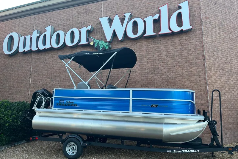 The Image of 2026 Sun Tracker Party Barge 18 DLX pontoon boat displayed at Outdoor World. - 0