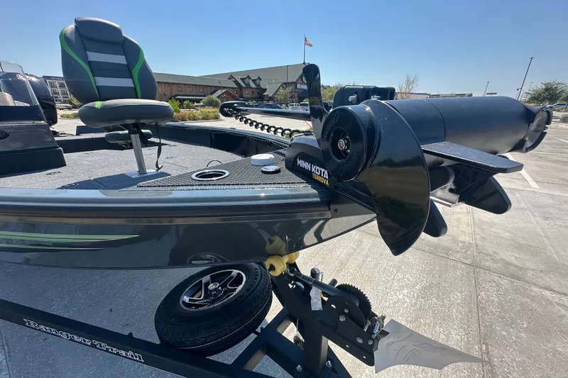 Slide: The Image of 2026 Ranger VS1782SC Angler boat with Minn Kota Terrova motor, parked outdoors. - 16
