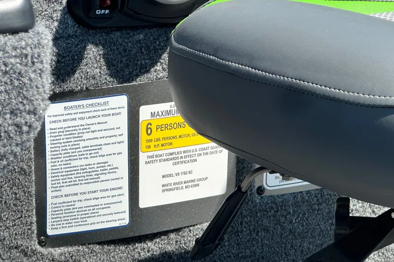 Slide: The Image of Boater's checklist and capacity label on 2026 Ranger VS1782SC Angler boat seat. - 20