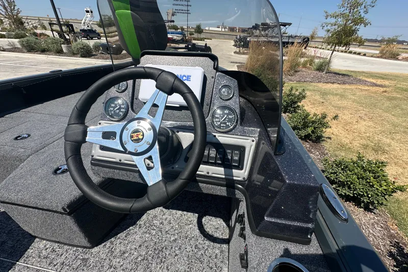 Slide: The Image of 2026 Ranger VS1782SC Angler boat dashboard with steering wheel and gauges. - 19