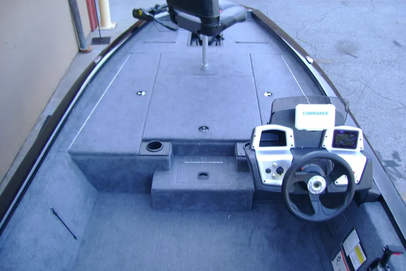 Slide: The Image of 2026 Tracker Pro Team 190 boat interior with steering console and navigation equipment. - 5
