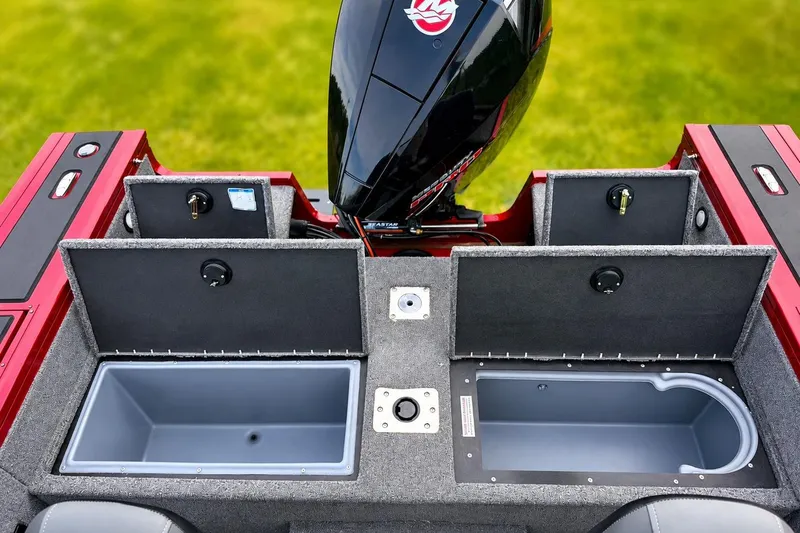 Slide: The Image of 2026 Tracker Targa V-19 Combo boat storage compartments and engine, featuring sleek design and functionality. - 6