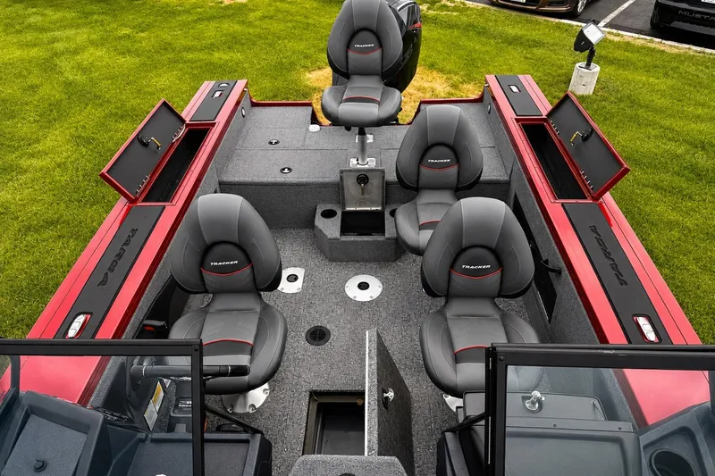 Slide: The Image of 2026 Tracker Targa V-19 Combo boat interior with seating and storage compartments. - 10