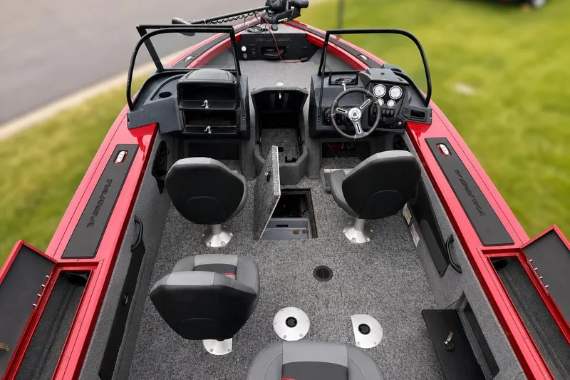 Slide: The Image of 2026 Tracker Targa V-19 Combo boat interior with seating and control panel. - 9