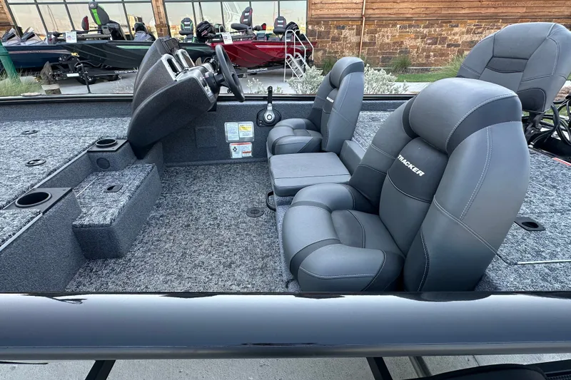 Slide: The Image of 2026 Tracker Pro Team 175 boat interior with gray seating and console. - 15