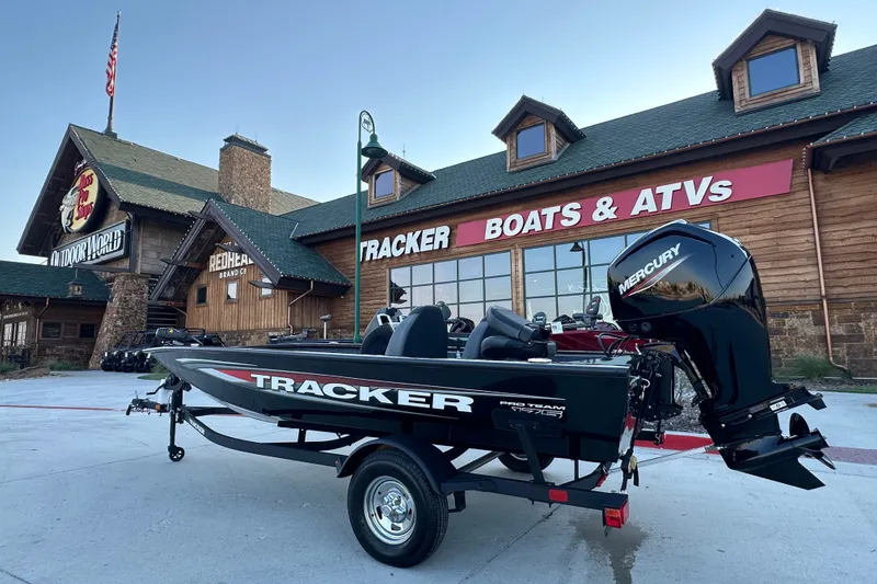 The Image of 2026 Tracker Pro Team 175 boat displayed outside Tracker Boats & ATVs store. - 1
