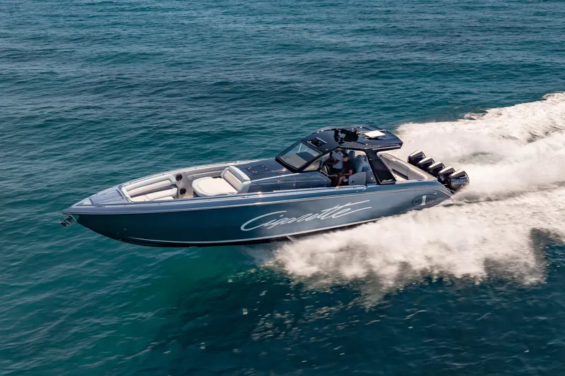 Slide: The Image of 2024 Cigarette 42' Auroris speedboat cruising on open water. - 14