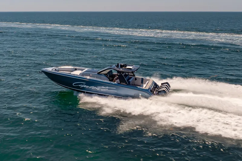 Slide: The Image of 2024 Cigarette 42' Auroris speedboat cruising on open ocean waters. - 16