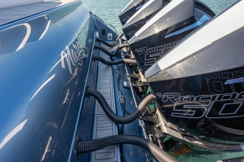 Slide: The Image of 2024 Cigarette 42' Auroris boat with powerful racing engines on display. - 21