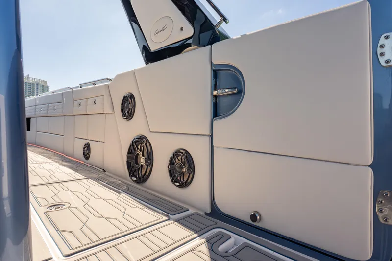 Slide: The Image of 2024 Cigarette 42' Auroris boat interior with sleek design and premium audio system. - 26
