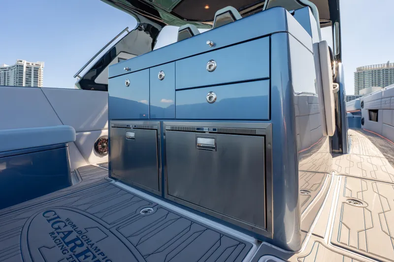 Slide: The Image of 2024 Cigarette 42' Auroris yacht interior with sleek cabinetry and modern design. - 27