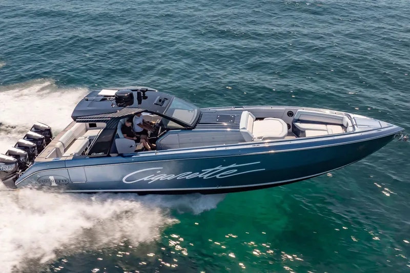Slide: The Image of 2024 Cigarette 42' Auroris speedboat cruising on open water. - 3