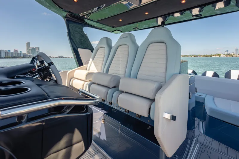 Slide: The Image of 2024 Cigarette 42' Auroris luxury boat interior with sleek seating and modern design. - 34
