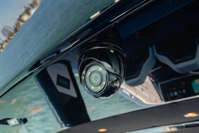Slide: The Image of Security camera on 2024 Cigarette 42' Auroris boat, overlooking water. - 36