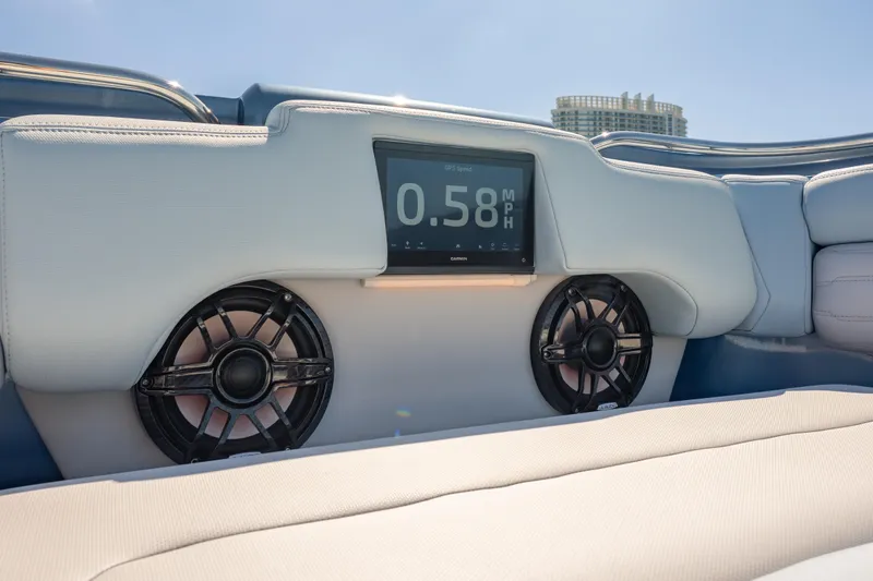 Slide: The Image of 2024 Cigarette 42' Auroris boat interior with GPS display and speakers. - 40