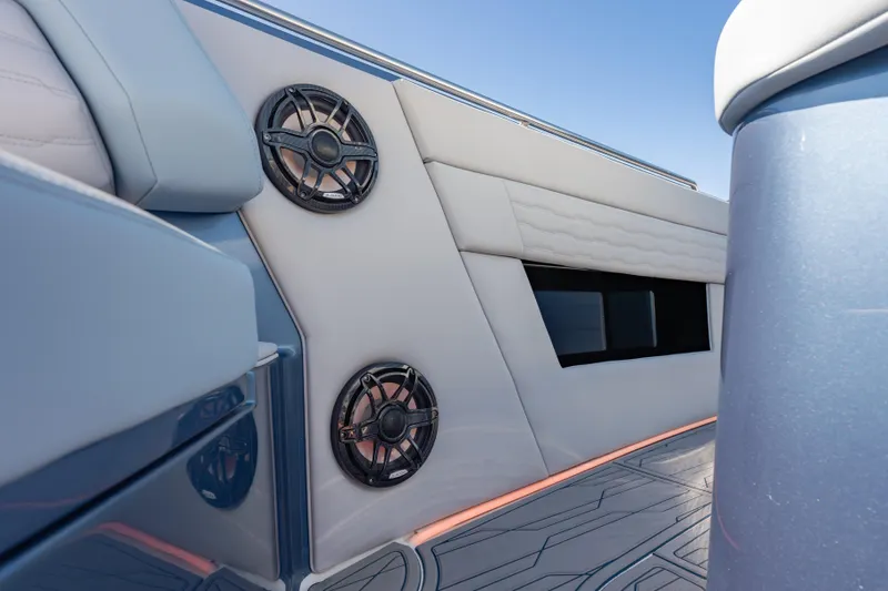 Slide: The Image of 2024 Cigarette 42' Auroris yacht interior with sleek design and modern audio system. - 43