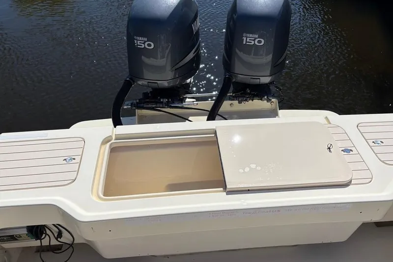 Slide: The Image of 2008 Parker 2510 XL Walkaround boat with twin Yamaha 150 engines, rear view. - 11