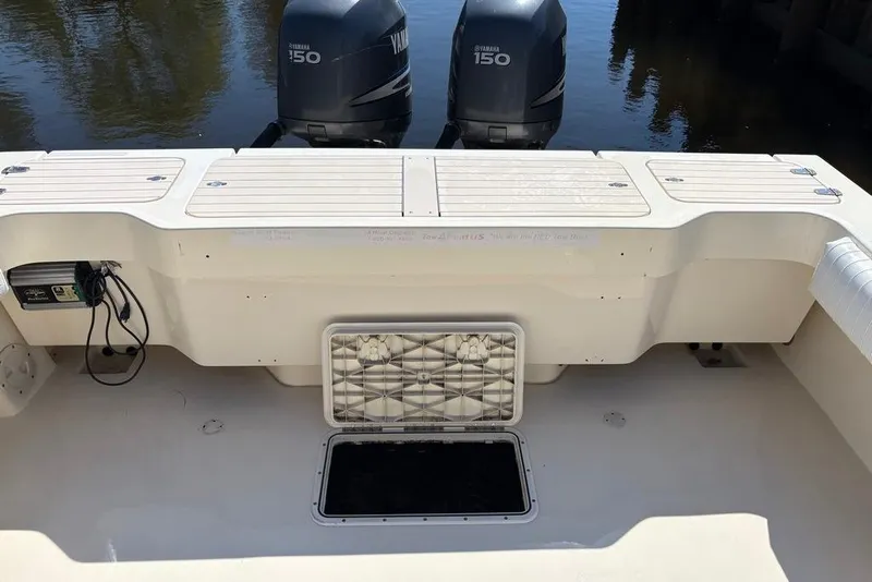 Slide: The Image of 2008 Parker 2510 XL Walkaround boat with Yamaha 150 engines, rear deck view. - 15