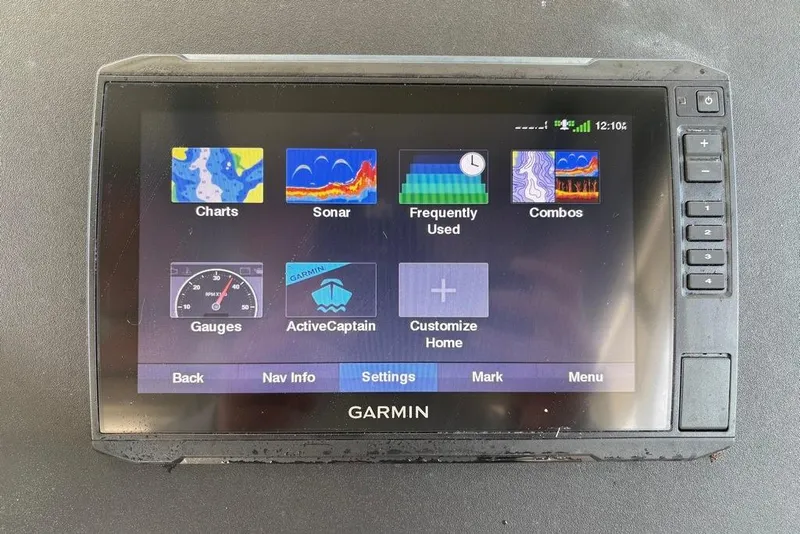 Slide: The Image of Garmin marine GPS display showing navigation options on a Parker 2510 XL Walkaround, 2008 model. - 23