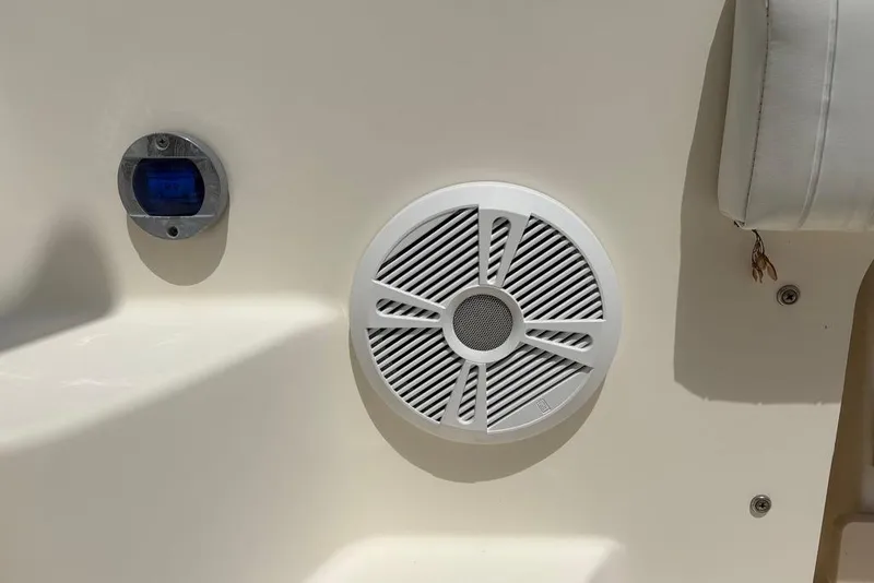Slide: The Image of White speaker and blue light on 2008 Parker 2510 XL Walkaround boat interior. - 35