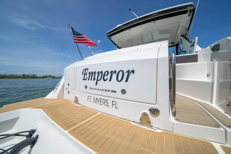 Slide: The Image of 2024 Sea Ray Sundancer 320 Outboard boat named "Emperor" docked in Ft. Myers, FL. - 17