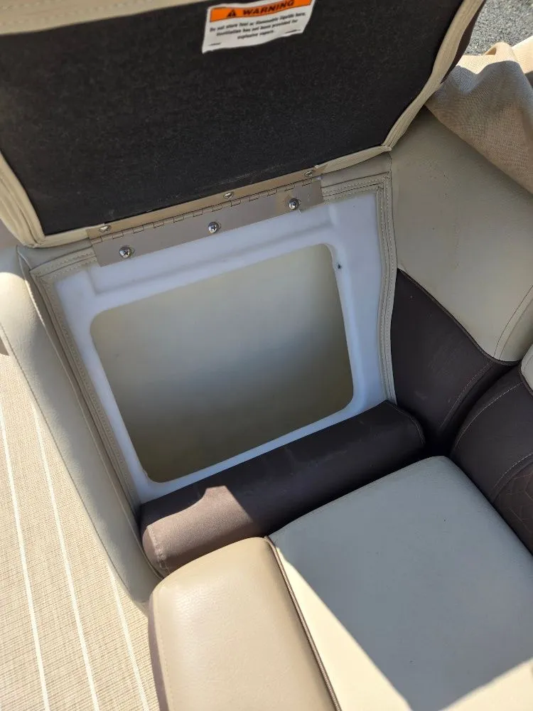 Slide: The Image of Interior view of a seat compartment on a 2019 Godfrey Sweetwater 2386 Coastal Tritoon. - 17