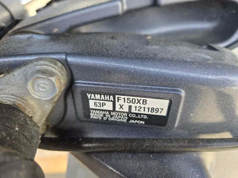 Slide: The Image of Yamaha F150XB engine plate on Godfrey Sweetwater 2386 Coastal Tritoon, 2019 model. - 22