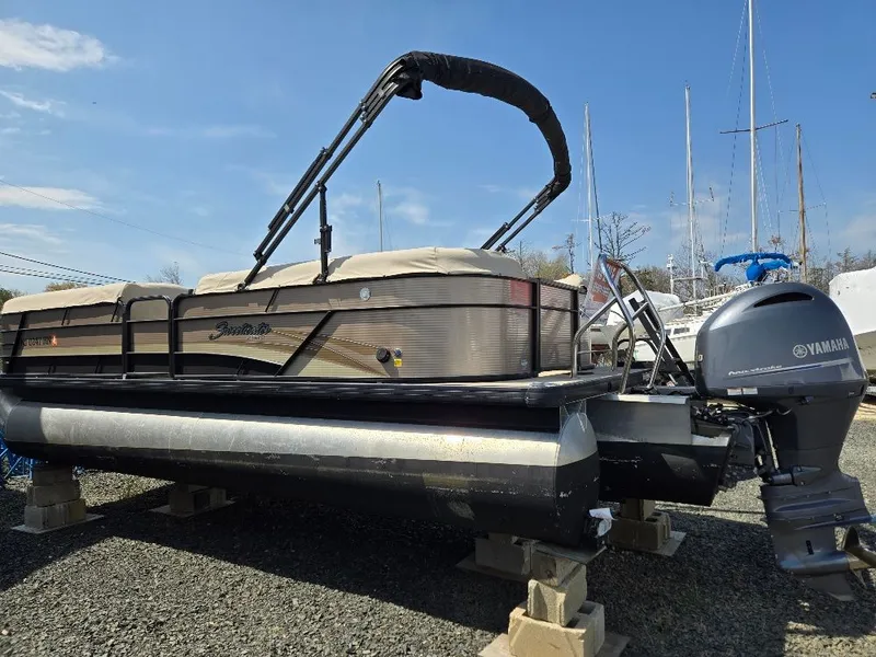 Slide: The Image of 2019 Godfrey Sweetwater 2386 Coastal tritoon with Yamaha engine on blocks. - 3