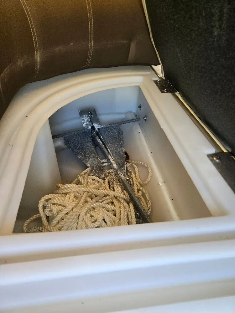 Slide: The Image of Anchor and rope in storage compartment of 2019 Godfrey Sweetwater 2386 Coastal Tritoon. - 9