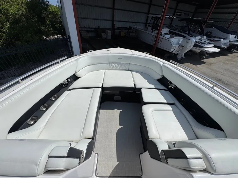Slide: The Image of Interior view of 2021 Regal 29 OBX boat with white seating. - 17