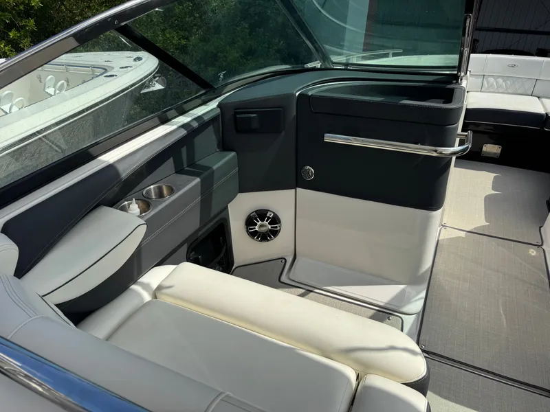 Slide: The Image of Interior of a 2021 Regal 29 OBX boat with sleek seating. - 19