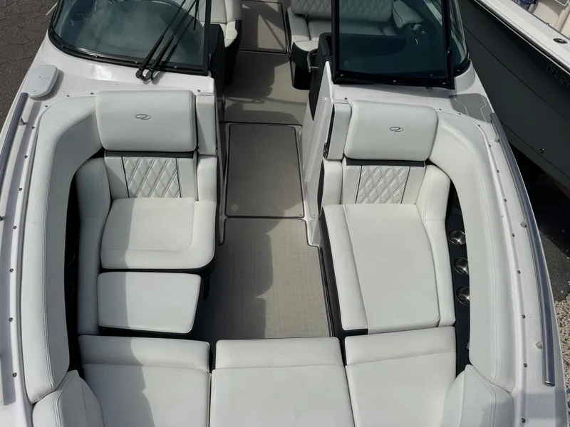 Slide: The Image of Interior of 2021 Regal 29 OBX with white leather seating. - 22