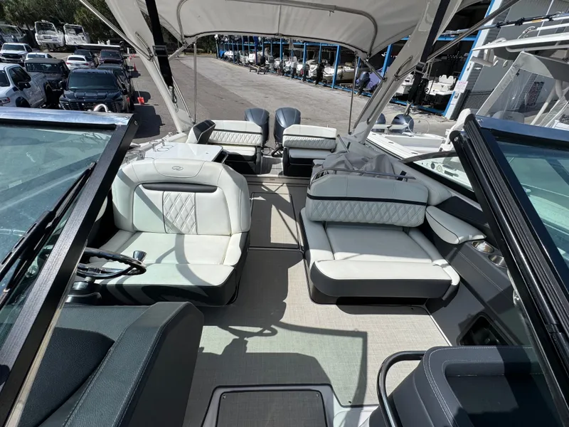 Slide: The Image of Interior of a 2021 Regal 29 OBX boat with luxurious seating. - 25