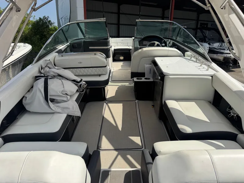 Slide: The Image of Interior of a 2021 Regal 29 OBX boat with white seating. - 4