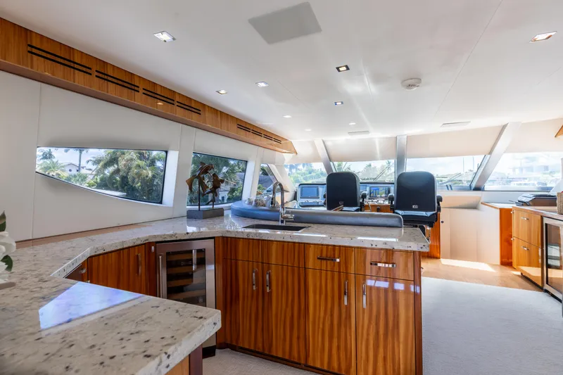 Slide: The Image of Luxurious interior of 2014 Hatteras 80 Motor Yacht Sky Lounge with modern design and panoramic windows. - 31