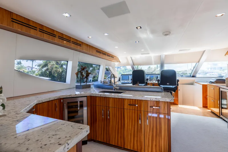 Slide: The Image of Luxurious interior of 2014 Hatteras 80 Motor Yacht Sky Lounge with modern design and panoramic windows. - 34