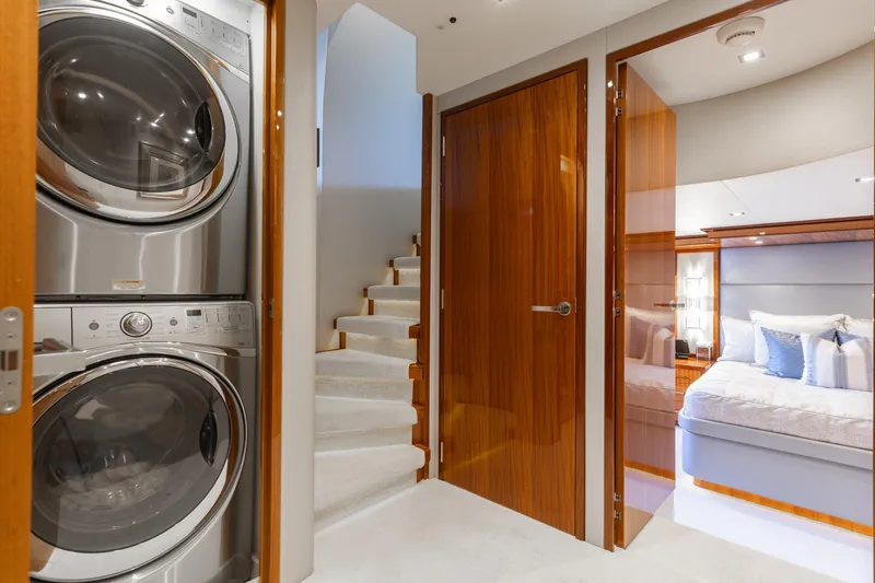 Slide: The Image of Laundry area and bedroom in 2014 Hatteras 80 Motor Yacht Sky Lounge. - 36