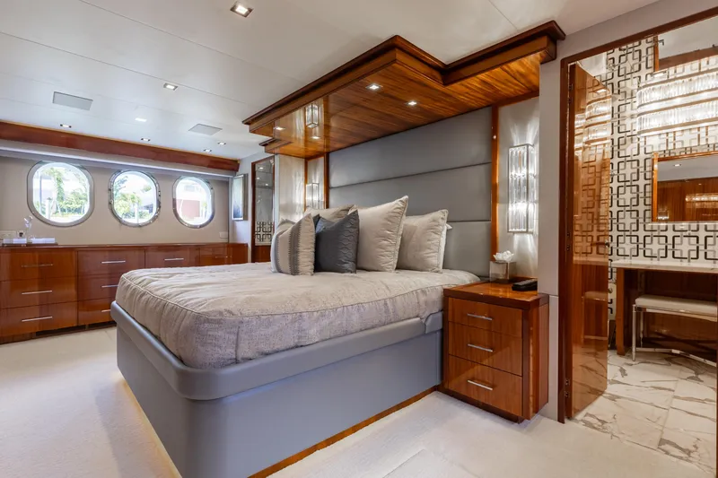 Slide: The Image of Luxurious bedroom in 2014 Hatteras 80 Motor Yacht Sky Lounge with elegant wood finishes. - 40