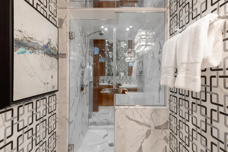 Slide: The Image of Luxurious bathroom with marble shower in 2014 Hatteras 80 Motor Yacht Sky Lounge. - 43