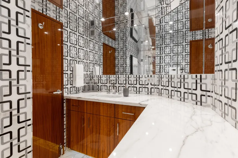Slide: The Image of Luxurious bathroom with geometric patterned walls in 2014 Hatteras 80 Motor Yacht Sky Lounge. - 46