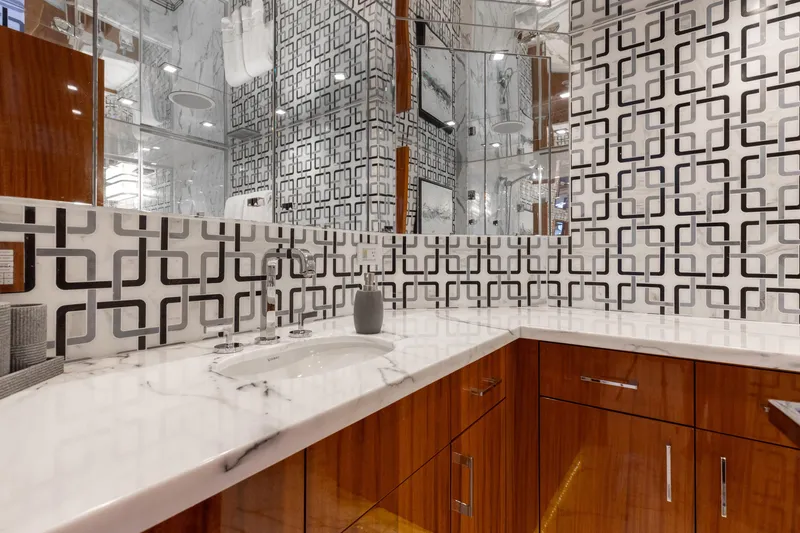 Slide: The Image of Luxurious bathroom in 2014 Hatteras 80 Motor Yacht Sky Lounge with modern geometric tiles. - 47