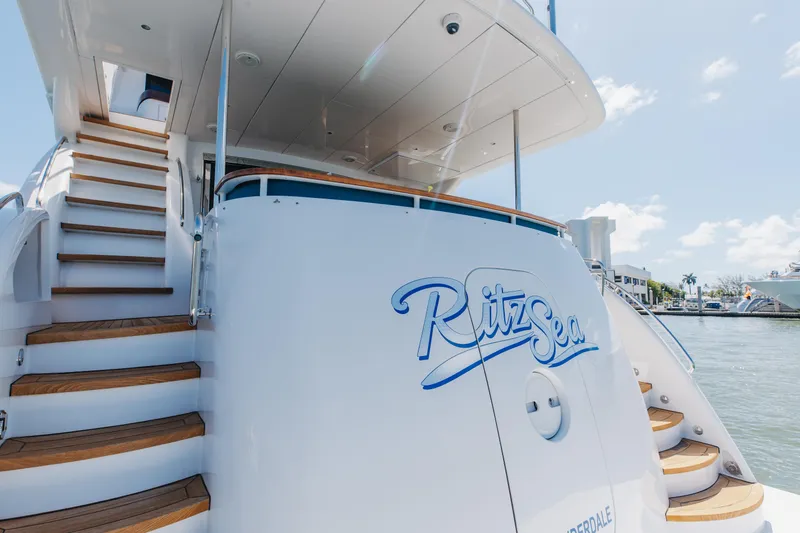 Slide: The Image of Luxury yacht "Ritz Sea" with elegant wooden steps, Hatteras 80 Motor Yacht Sky Lounge, 2014. - 6