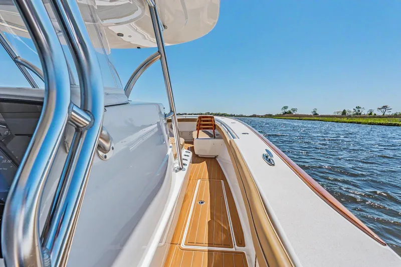 Slide: The Image of 2021 Valhalla Boatworks V-41 cruising on a sunny day, showcasing sleek design and craftsmanship. - 13