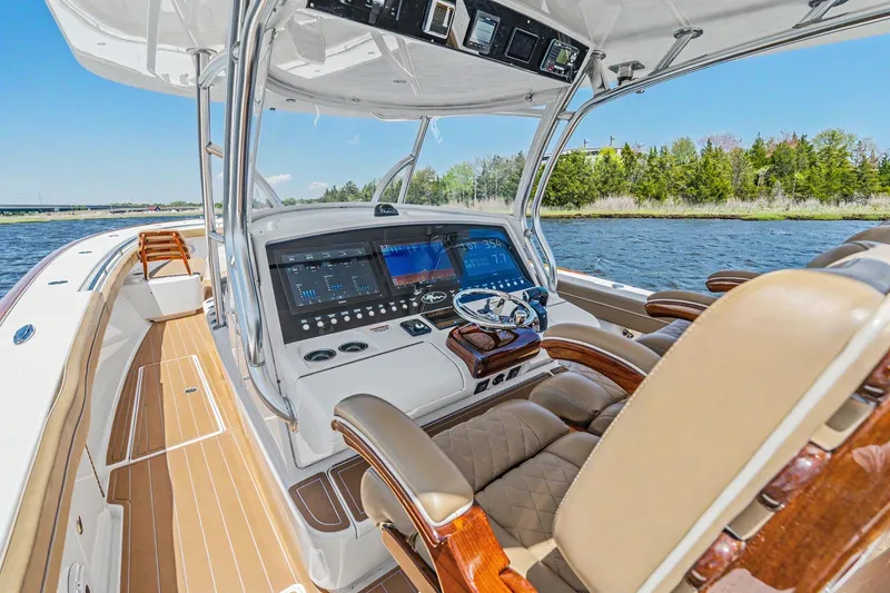 Slide: The Image of 2021 Valhalla Boatworks V-41 helm with advanced navigation system on a sunny day. - 16