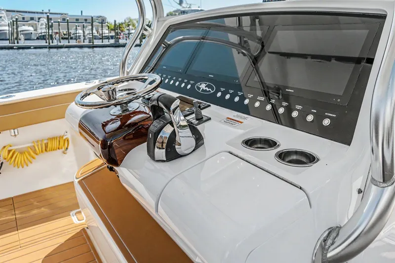 Slide: The Image of 2021 Valhalla Boatworks V-41 helm with modern controls and navigation displays. - 17
