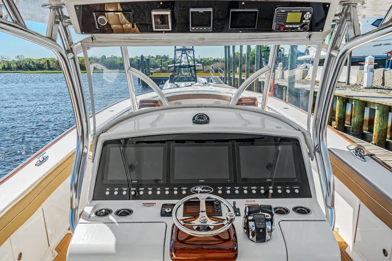 Slide: The Image of 2021 Valhalla Boatworks V-41 helm with advanced navigation displays and controls. - 18